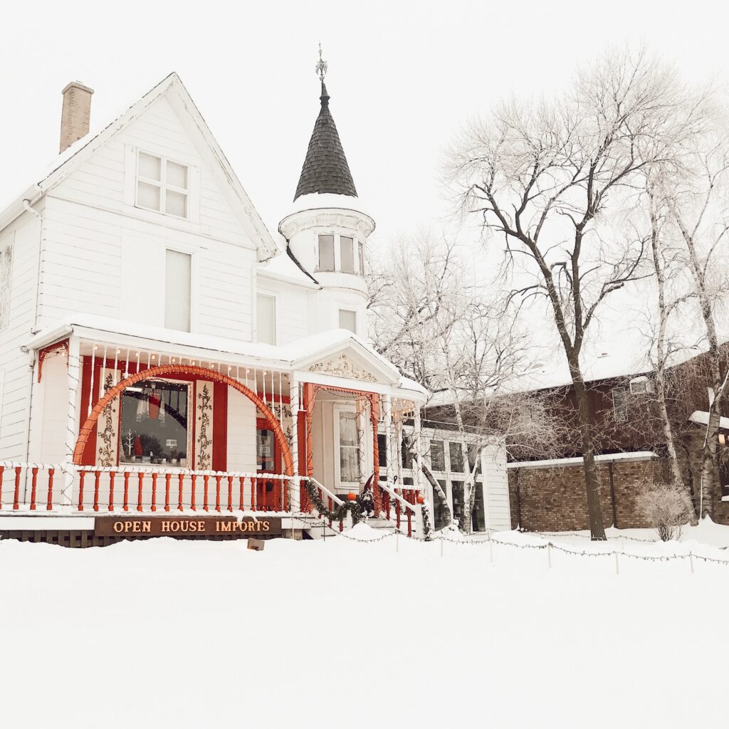 Open House Imports covered in snow in Mount Horeb, Wisconsin