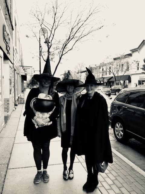 three witches walking down main street i mount horeb during halloween event witches night out in mount horeb, wi